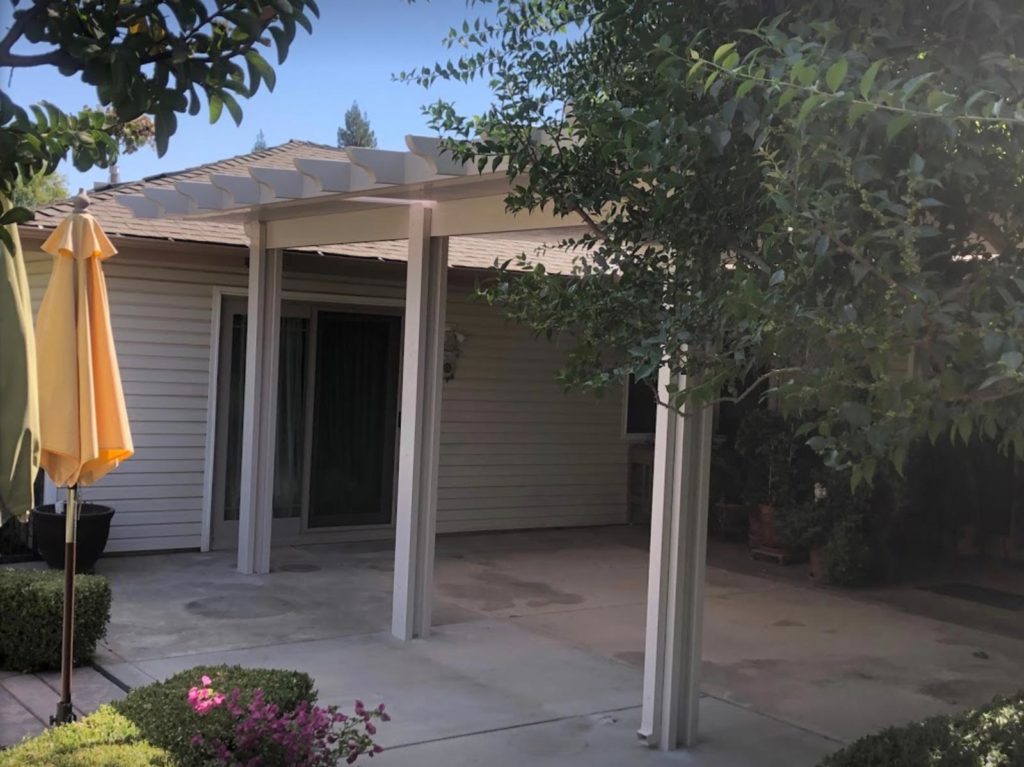 Custom covered patio by ProPatio by Weber Construction