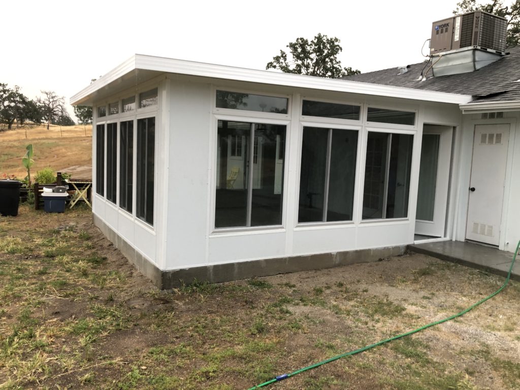 Custom attached sunroom.